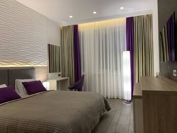 Фото номера Люкс с видом на город Отель Premium Hotel г. Славянск 9
