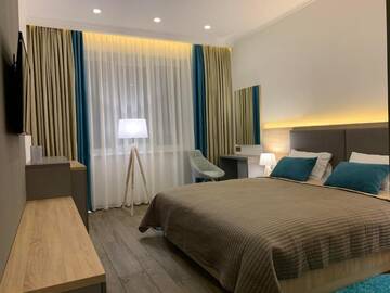 Фото номера Люкс с видом на город Отель Premium Hotel г. Славянск 14